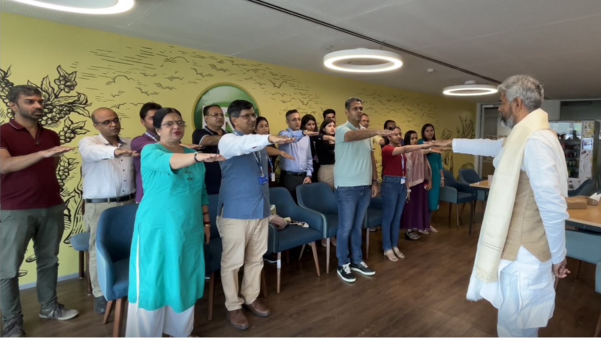 Group of people with arms raised