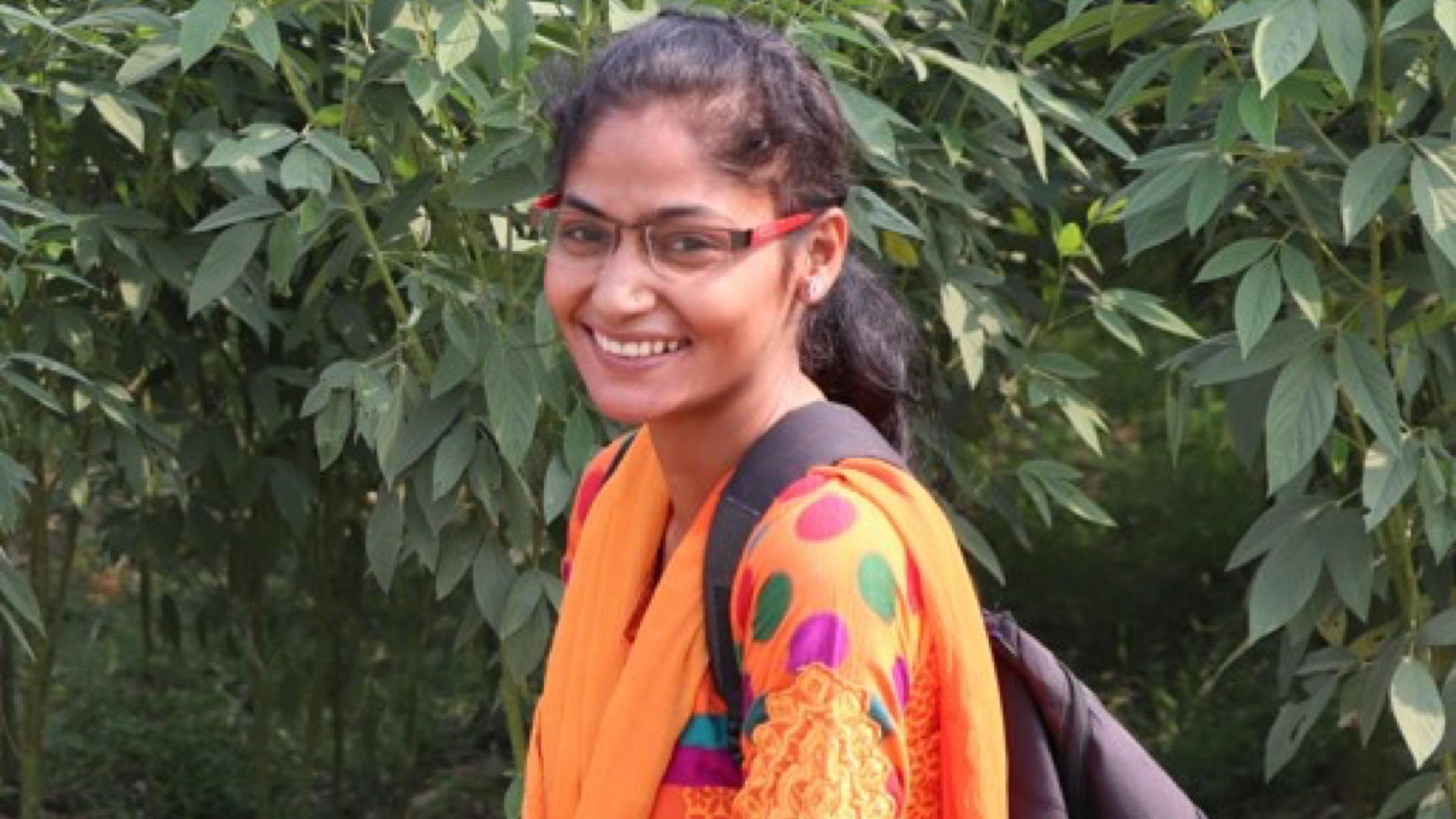 Young woman, smiling