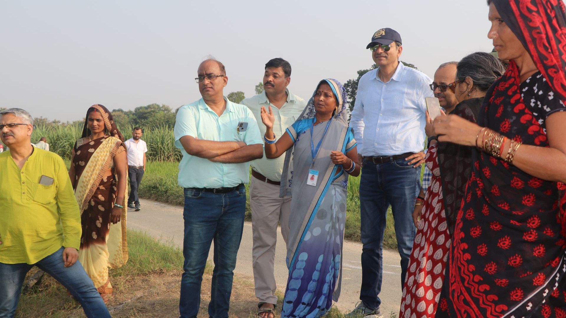 A group of people standing in a field