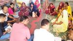 Community discussion in Uttar Pradesh.